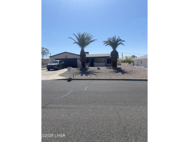 This home has been updated with a new heat pump AC conditioner on London Bridge Golf Course in Arizona - for sale on GolfHomes.com, golf home, golf lot