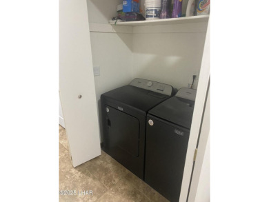 This home has been updated with a new heat pump AC conditioner on London Bridge Golf Course in Arizona - for sale on GolfHomes.com, golf home, golf lot