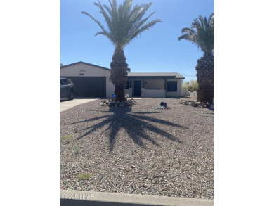 This home has been updated with a new heat pump AC conditioner on London Bridge Golf Course in Arizona - for sale on GolfHomes.com, golf home, golf lot