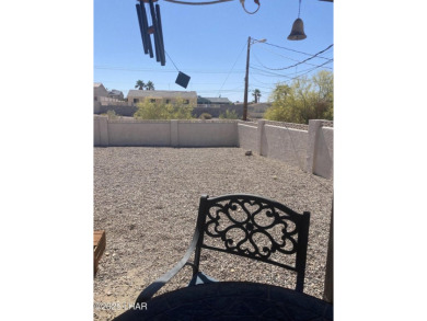 This home has been updated with a new heat pump AC conditioner on London Bridge Golf Course in Arizona - for sale on GolfHomes.com, golf home, golf lot