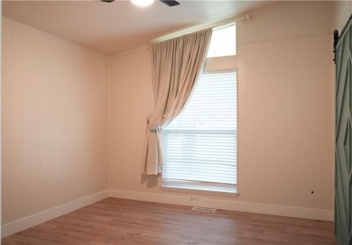 Completely remodeled and packed with charm, this 2 bed, 1.5 bath on Bella Vista Country Club - Berksdale in Arkansas - for sale on GolfHomes.com, golf home, golf lot