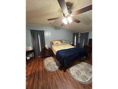 2 Bedroom | 2 Bath | 1,296 sq ft in highly sought after 55+ on Lake Henry Golf Club in Florida - for sale on GolfHomes.com, golf home, golf lot