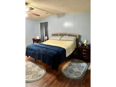 2 Bedroom | 2 Bath | 1,296 sq ft in highly sought after 55+ on Lake Henry Golf Club in Florida - for sale on GolfHomes.com, golf home, golf lot