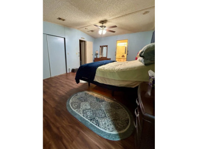 2 Bedroom | 2 Bath | 1,296 sq ft in highly sought after 55+ on Lake Henry Golf Club in Florida - for sale on GolfHomes.com, golf home, golf lot