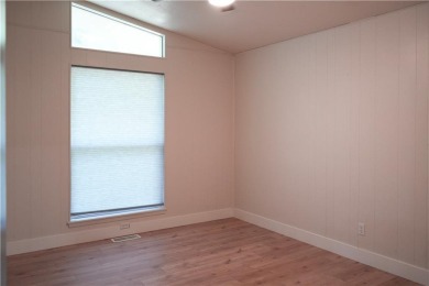 Completely remodeled and packed with charm, this 2 bed, 1.5 bath on Bella Vista Country Club - Berksdale in Arkansas - for sale on GolfHomes.com, golf home, golf lot