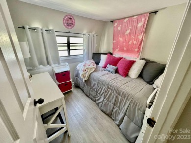 This beautifully remodeled tiny home is perfect for your weekend on Densons Creek Golf Course in North Carolina - for sale on GolfHomes.com, golf home, golf lot