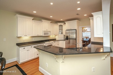 Welcome home to this well maintained custom built home by Tom on Sea Trail Golf Resort in North Carolina - for sale on GolfHomes.com, golf home, golf lot