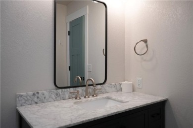 Completely remodeled and packed with charm, this 2 bed, 1.5 bath on Bella Vista Country Club - Berksdale in Arkansas - for sale on GolfHomes.com, golf home, golf lot