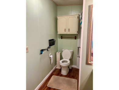 2 Bedroom | 2 Bath | 1,296 sq ft in highly sought after 55+ on Lake Henry Golf Club in Florida - for sale on GolfHomes.com, golf home, golf lot