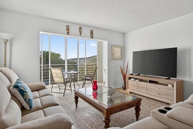 Beautiful Water View 2/2*IMPACT WINDOWS*, Updated Washer & Dryer on Wynmoor Golf Course in Florida - for sale on GolfHomes.com, golf home, golf lot