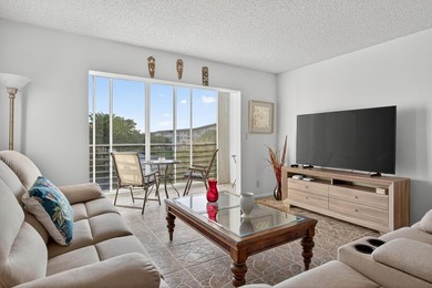 Beautiful Water View 2/2*IMPACT WINDOWS*, Updated Washer & Dryer on Wynmoor Golf Course in Florida - for sale on GolfHomes.com, golf home, golf lot