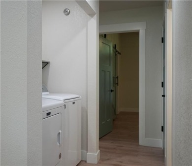 Completely remodeled and packed with charm, this 2 bed, 1.5 bath on Bella Vista Country Club - Berksdale in Arkansas - for sale on GolfHomes.com, golf home, golf lot