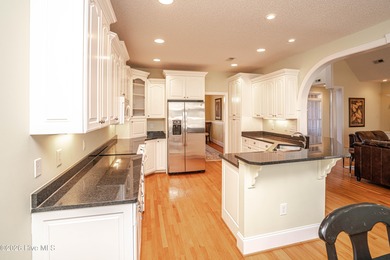 Welcome home to this well maintained custom built home by Tom on Sea Trail Golf Resort in North Carolina - for sale on GolfHomes.com, golf home, golf lot