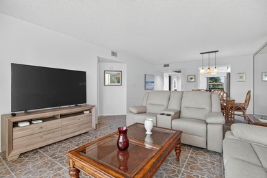 Beautiful Water View 2/2*IMPACT WINDOWS*, Updated Washer & Dryer on Wynmoor Golf Course in Florida - for sale on GolfHomes.com, golf home, golf lot