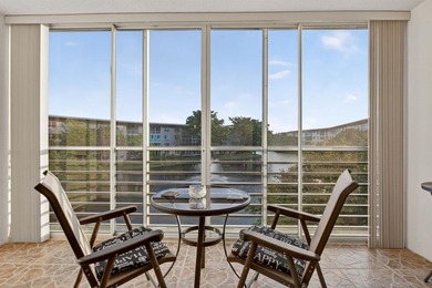 Beautiful Water View 2/2*IMPACT WINDOWS*, Updated Washer & Dryer on Wynmoor Golf Course in Florida - for sale on GolfHomes.com, golf home, golf lot