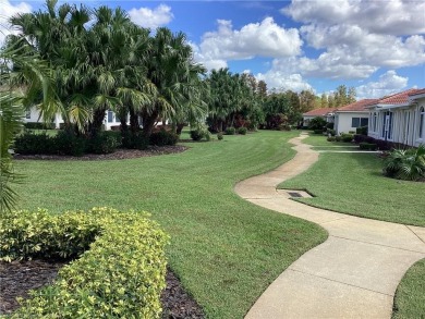 Mediterranean style Villa in beautiful Hampton Woods, located in on Sun n Lake Golf and Country Club in Florida - for sale on GolfHomes.com, golf home, golf lot