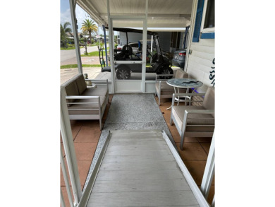 2 Bedroom | 2 Bath | 1,296 sq ft in highly sought after 55+ on Lake Henry Golf Club in Florida - for sale on GolfHomes.com, golf home, golf lot