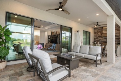 Step into a serene oasis where luxury meets leisure--an on Lakewood National Golf Club in Florida - for sale on GolfHomes.com, golf home, golf lot