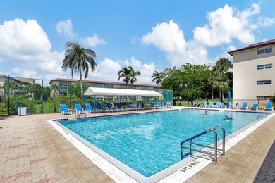 Beautiful Water View 2/2*IMPACT WINDOWS*, Updated Washer & Dryer on Wynmoor Golf Course in Florida - for sale on GolfHomes.com, golf home, golf lot