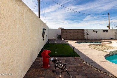 Welcome to 1660 Topaz Dr - A Beautiful 3-Bedroom, 2-Bathroom, Rv on London Bridge Golf Course in Arizona - for sale on GolfHomes.com, golf home, golf lot