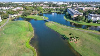 Beautiful Water View 2/2*IMPACT WINDOWS*, Updated Washer & Dryer on Wynmoor Golf Course in Florida - for sale on GolfHomes.com, golf home, golf lot