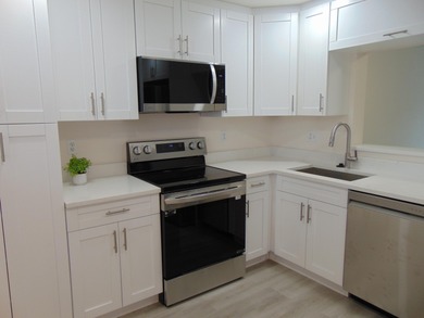 WELCOME TO THIS SPARKLING CONDO THAT HAS BEEN UPDATED on Poinciana Golf Club in Florida - for sale on GolfHomes.com, golf home, golf lot