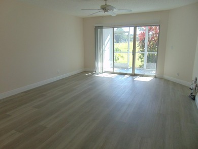 WELCOME TO THIS SPARKLING CONDO THAT HAS BEEN UPDATED on Poinciana Golf Club in Florida - for sale on GolfHomes.com, golf home, golf lot