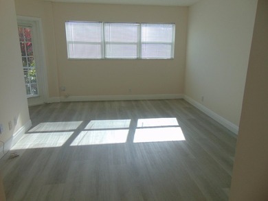 WELCOME TO THIS SPARKLING CONDO THAT HAS BEEN UPDATED on Poinciana Golf Club in Florida - for sale on GolfHomes.com, golf home, golf lot