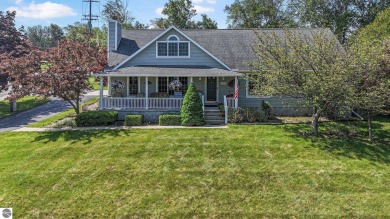 Located just blocks from Lake Michigan and adjacent to Manistee on Manistee Golf and Country Club in Michigan - for sale on GolfHomes.com, golf home, golf lot