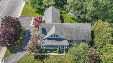 Located just blocks from Lake Michigan and adjacent to Manistee on Manistee Golf and Country Club in Michigan - for sale on GolfHomes.com, golf home, golf lot