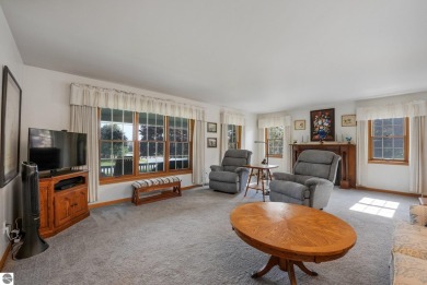 Located just blocks from Lake Michigan and adjacent to Manistee on Manistee Golf and Country Club in Michigan - for sale on GolfHomes.com, golf home, golf lot