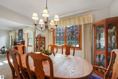 Located just blocks from Lake Michigan and adjacent to Manistee on Manistee Golf and Country Club in Michigan - for sale on GolfHomes.com, golf home, golf lot
