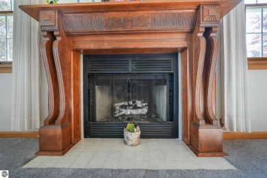 Located just blocks from Lake Michigan and adjacent to Manistee on Manistee Golf and Country Club in Michigan - for sale on GolfHomes.com, golf home, golf lot