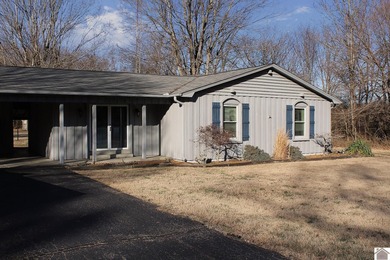 Solid 3BR/2BA ranch home ideally located directly across from on Murray Golf Course, Inc in Kentucky - for sale on GolfHomes.com, golf home, golf lot