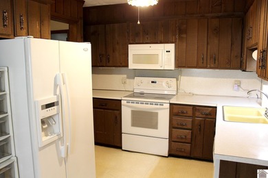 Solid 3BR/2BA ranch home ideally located directly across from on Murray Golf Course, Inc in Kentucky - for sale on GolfHomes.com, golf home, golf lot