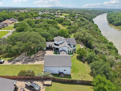 Exquisite luxury meets tranquil outdoors with this stunning home on Pecan Plantation Country Club in Texas - for sale on GolfHomes.com, golf home, golf lot