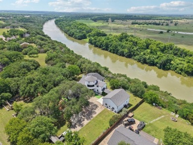 Exquisite luxury meets tranquil outdoors with this stunning home on Pecan Plantation Country Club in Texas - for sale on GolfHomes.com, golf home, golf lot