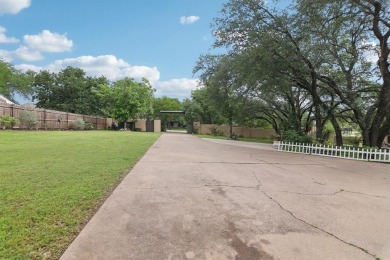 Exquisite luxury meets tranquil outdoors with this stunning home on Pecan Plantation Country Club in Texas - for sale on GolfHomes.com, golf home, golf lot