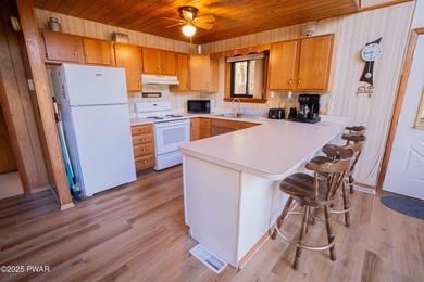 Meticulously maintained and beautifully updated chalet in the on The Hideout Golf in Pennsylvania - for sale on GolfHomes.com, golf home, golf lot