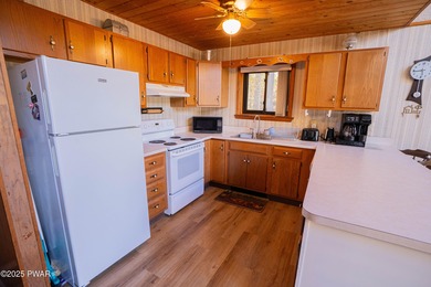 Meticulously maintained and beautifully updated chalet in the on The Hideout Golf in Pennsylvania - for sale on GolfHomes.com, golf home, golf lot
