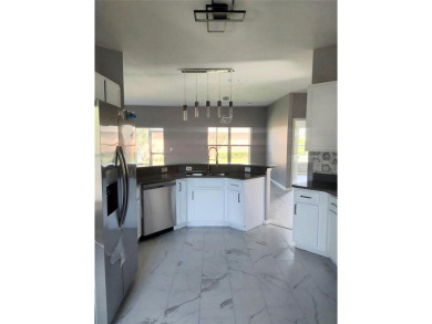 Welcome to your next chapter in this beautiful and completely on Stonegate Golf Club in Florida - for sale on GolfHomes.com, golf home, golf lot