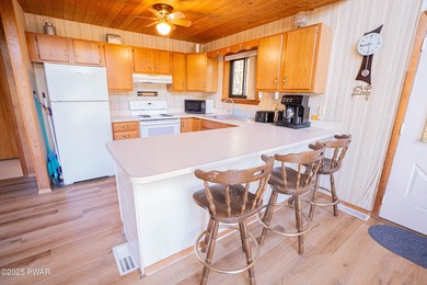 Meticulously maintained and beautifully updated chalet in the on The Hideout Golf in Pennsylvania - for sale on GolfHomes.com, golf home, golf lot