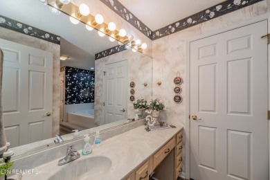 Beautiful home nestled among mature trees giving just enough on Emory Golf and Country Club in Tennessee - for sale on GolfHomes.com, golf home, golf lot