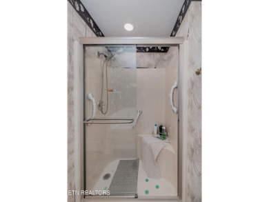 Beautiful home nestled among mature trees giving just enough on Emory Golf and Country Club in Tennessee - for sale on GolfHomes.com, golf home, golf lot