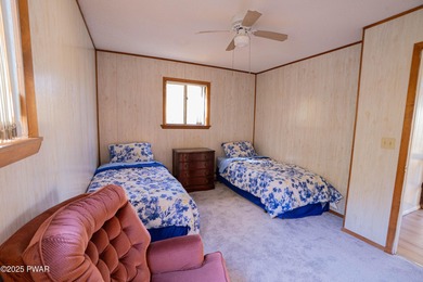 Meticulously maintained and beautifully updated chalet in the on The Hideout Golf in Pennsylvania - for sale on GolfHomes.com, golf home, golf lot