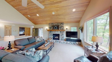 Step into this immaculate custom home, perfectly situated with on Michaywe Pines Course in Michigan - for sale on GolfHomes.com, golf home, golf lot