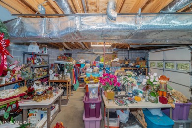 Beautiful home nestled among mature trees giving just enough on Emory Golf and Country Club in Tennessee - for sale on GolfHomes.com, golf home, golf lot