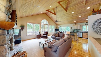Step into this immaculate custom home, perfectly situated with on Michaywe Pines Course in Michigan - for sale on GolfHomes.com, golf home, golf lot