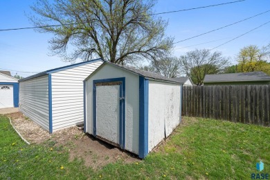 Cute as a button! This quaint one-level home is sure to impress on Elmwood Park Golf Course in South Dakota - for sale on GolfHomes.com, golf home, golf lot