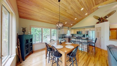 Step into this immaculate custom home, perfectly situated with on Michaywe Pines Course in Michigan - for sale on GolfHomes.com, golf home, golf lot